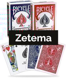 two decks of blue and red bicycle playing cards labeled "Zetema" for the card game