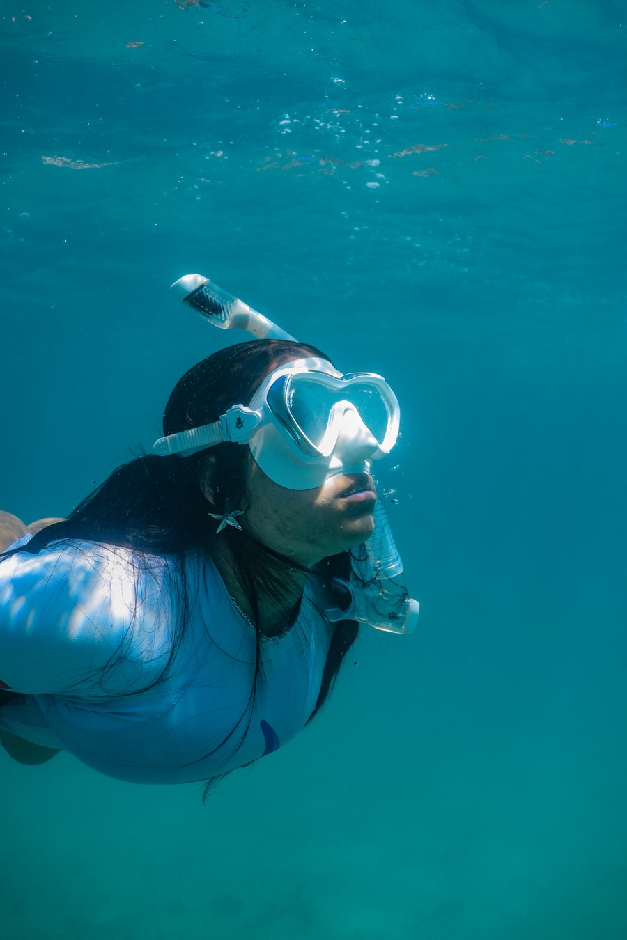 Ensaio subaquático nas Aguas cristalinas do Arraial