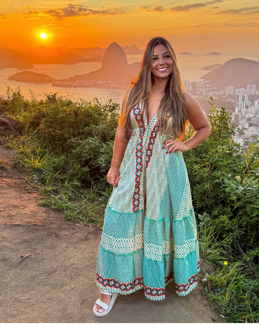 Ensaio fotográfico no Mirante Dona Marta com vista para o Rio de Janeiro ao pôr do sol. Experiência com fotos profissionais e paisagens incríveis.
