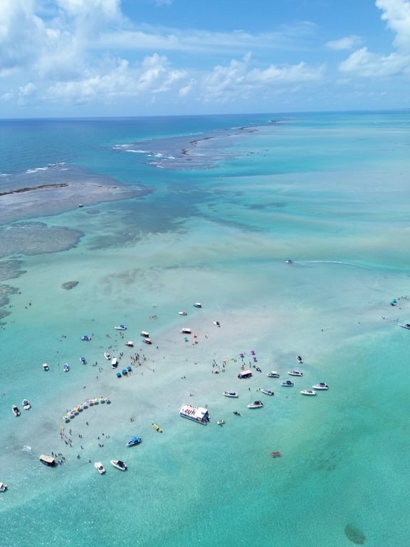 Banco de areia e formação das piscinas naturais