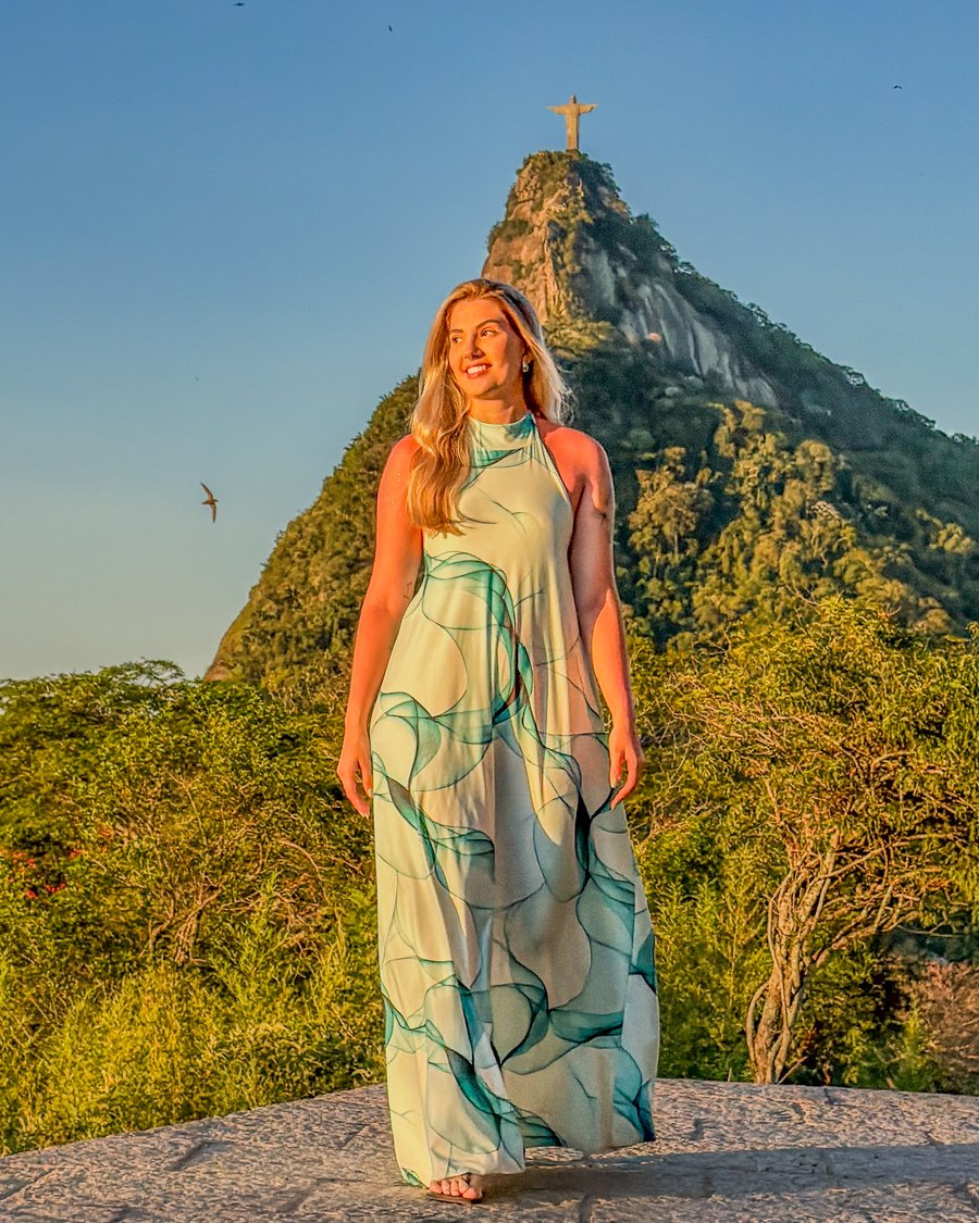 Ensaio fotográfico com vista para o Cristo Redentor e paisagens do Rio de Janeiro. Experiência completa com fotos profissionais.