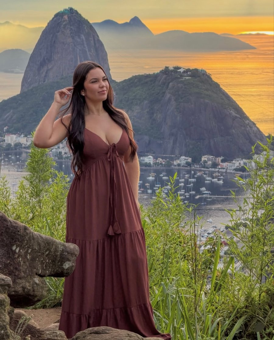 Fotos profissionais no Mirante Dona Marta com vista para o Pão de Açúcar. Experiência fotográfica exclusiva no Rio de Janeiro.