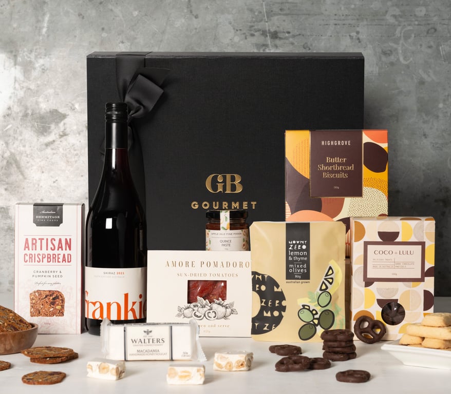 Good Wine and Nibbles Hamper — Frankie Shiraz, artisan wafers, nougat, and dark chocolate pretzels by Gourmet Basket