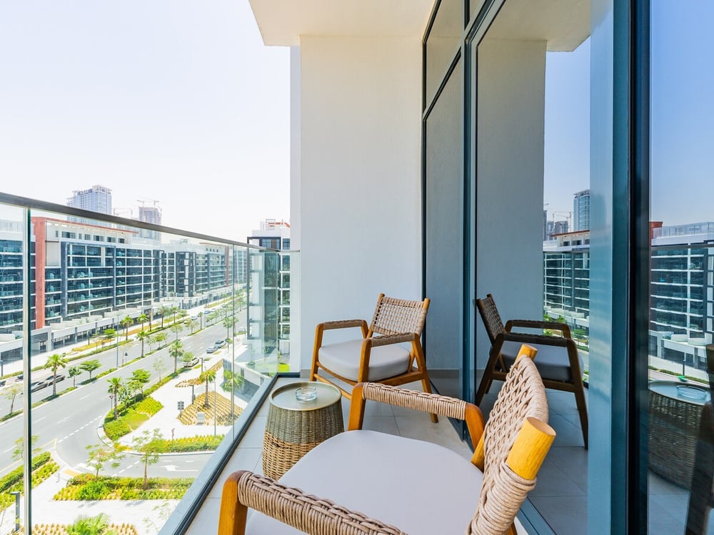 Balcony with seating and city skyline view