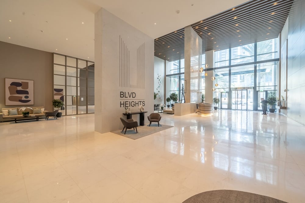 BLVD Heights building lobby entrance with marble floors