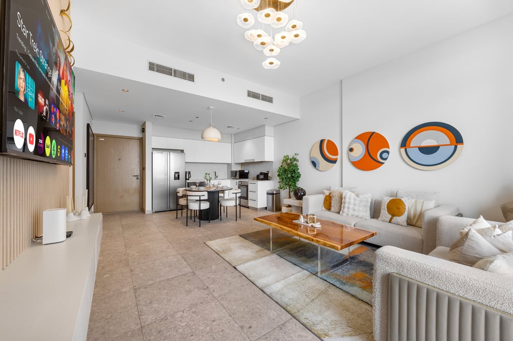 Open-plan living area with kitchen and dining visible