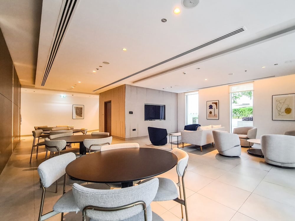 Building common lounge area with seating and TV