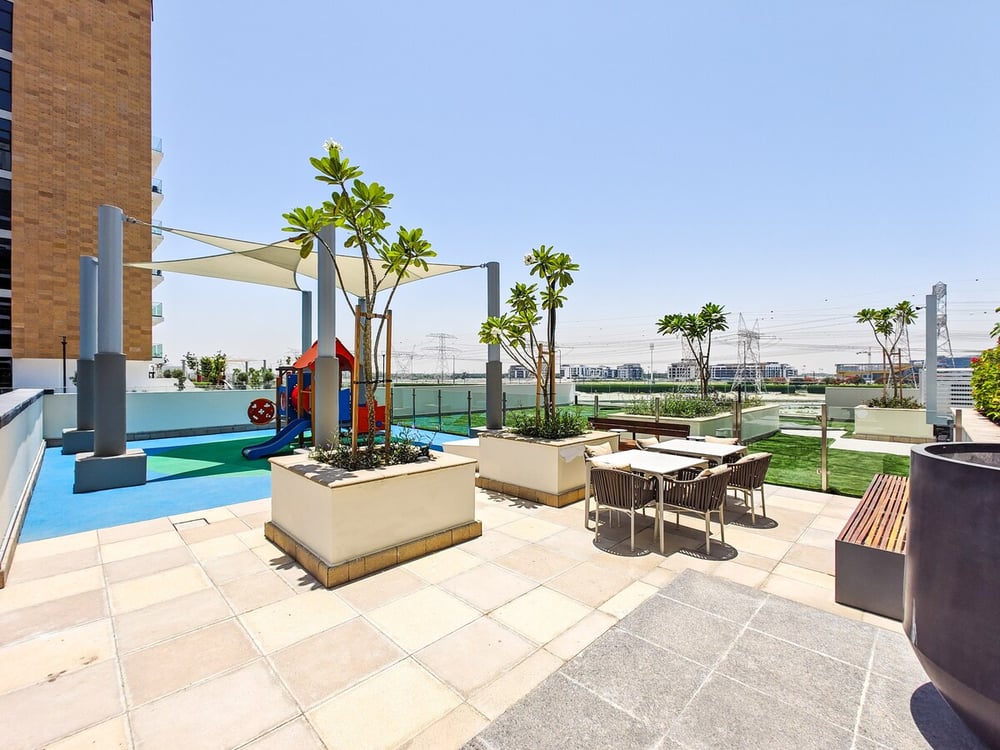 Rooftop common area with pool and playground