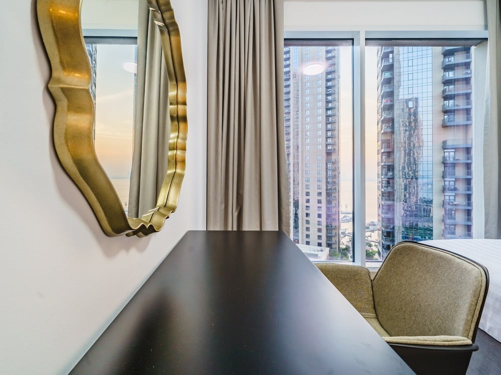Second bedroom desk area with city view