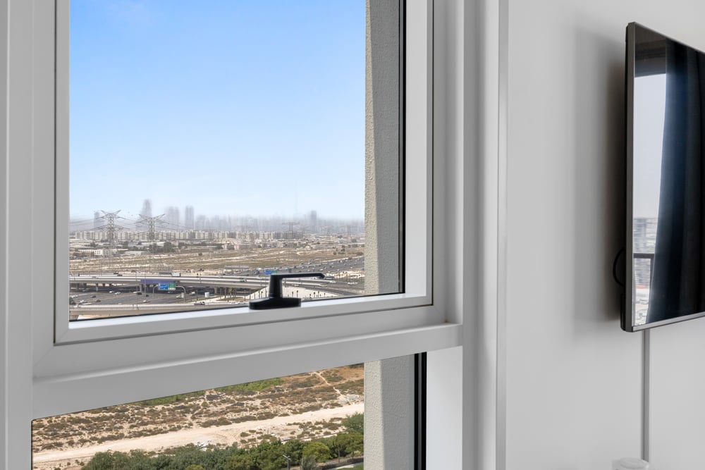 City skyline view through apartment window
