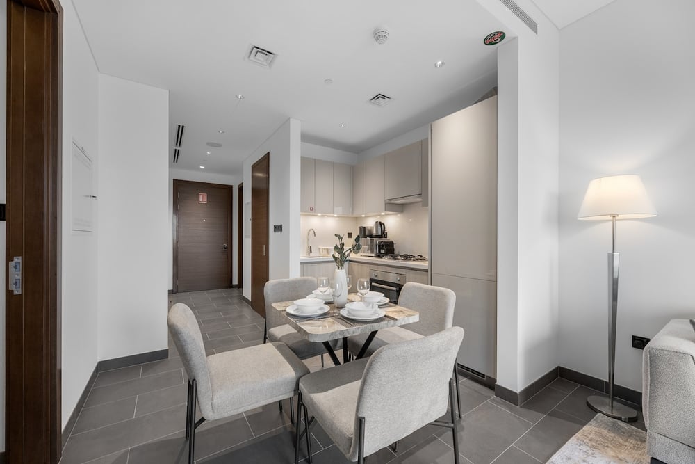Dining area with main entrance door visible