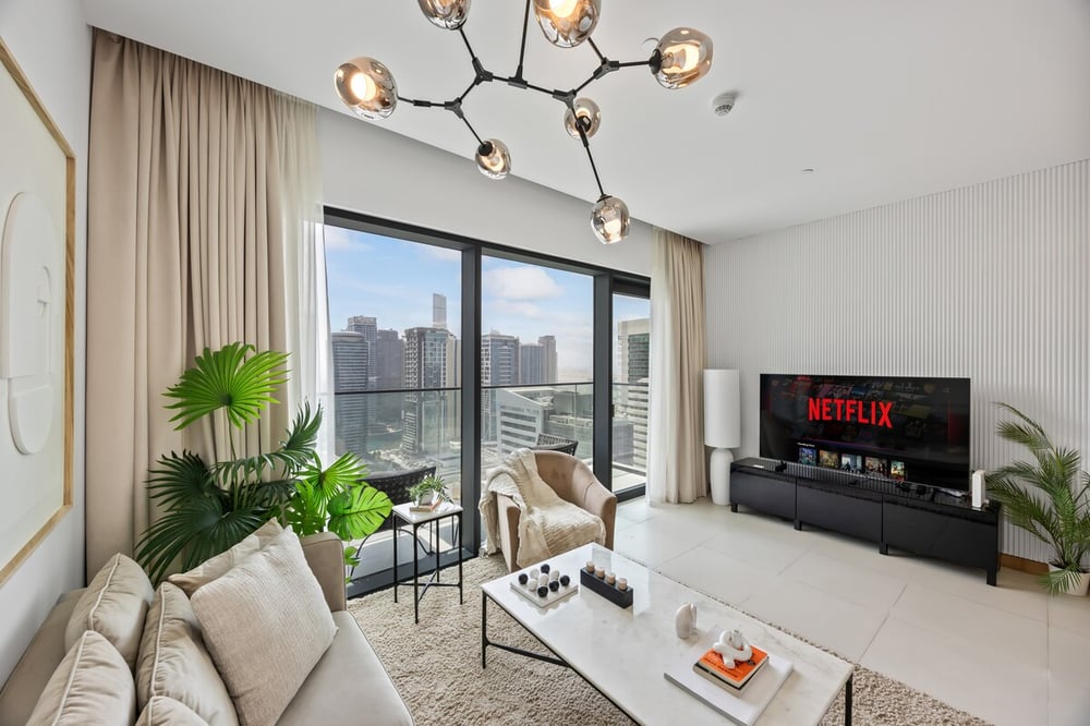 Living room with Netflix TV and city view