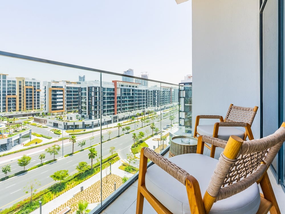 Balcony with seating and wide city view