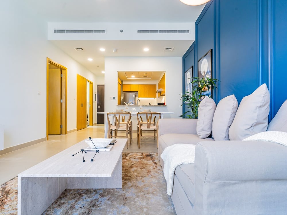 Open plan living room with entrance hallway and kitchen