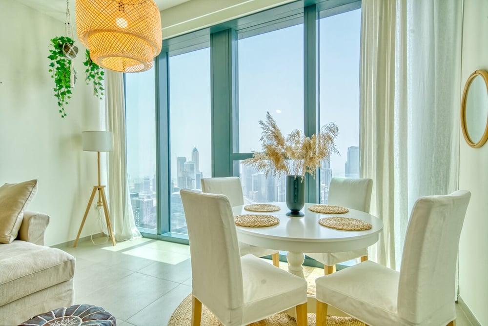 Dining area with round table and city view