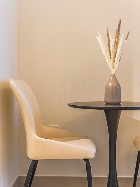 Dining chair and round table detail