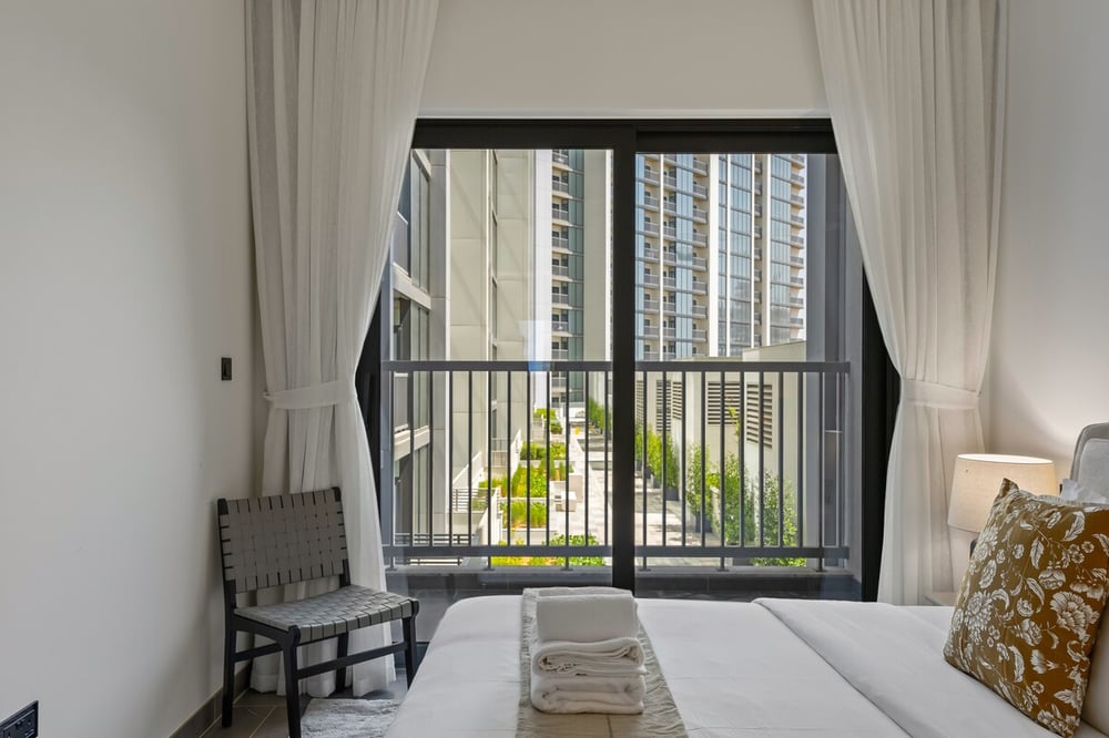 Bedroom balcony with city and high-rise view