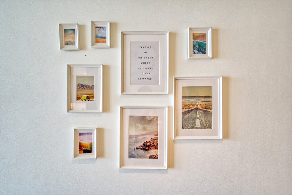 Wall with decorative photo frames