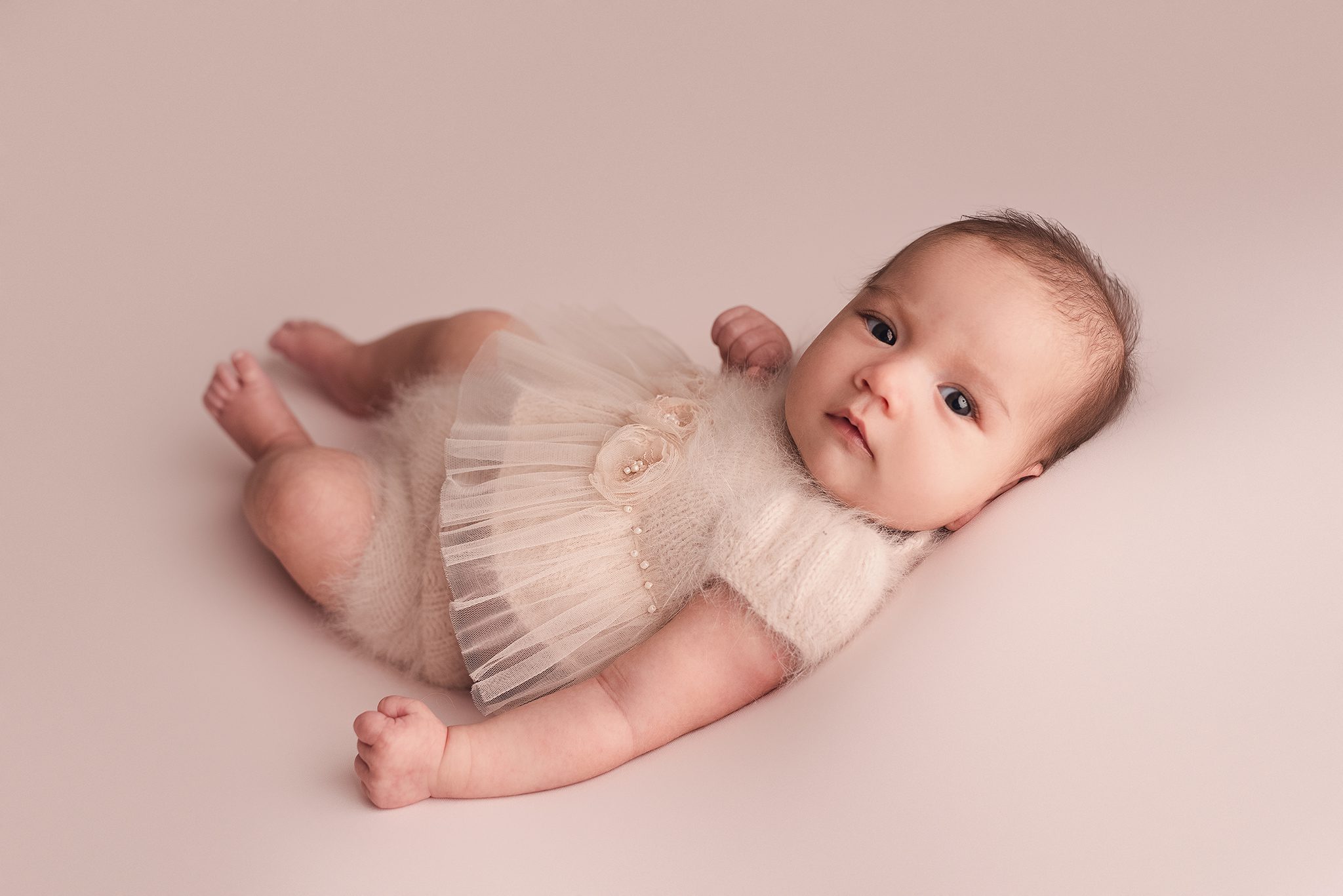 These images are a powerful reminder of the joy and love that surrounds the arrival of a newborn baby. If you're looking to commemorate this special time in your family's journey, I invite you to contact me for a newborn photography session in Wimbledon.