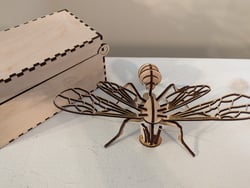 Wooden box and 3-D puzzle of a wasp - Angle 1