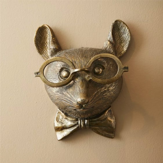 Image of E + E Louie wall mount on beige background.