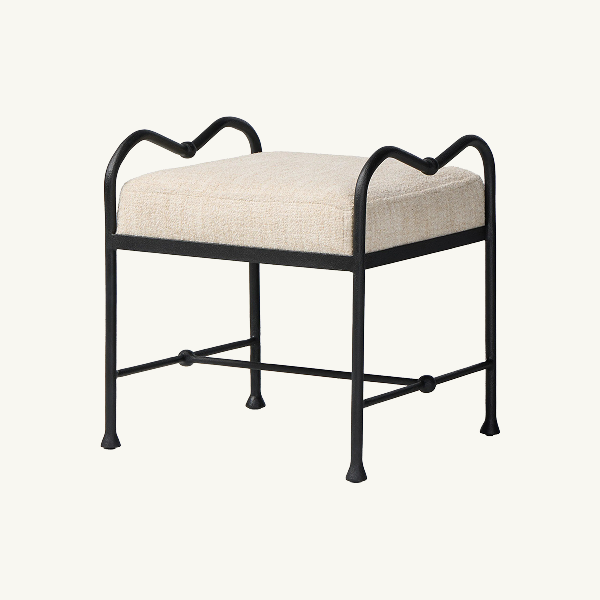 Upholstered accent stool with black metal frame