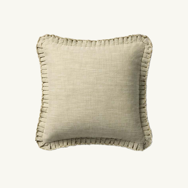 Neutral linen throw pillow with stitched edge detailing