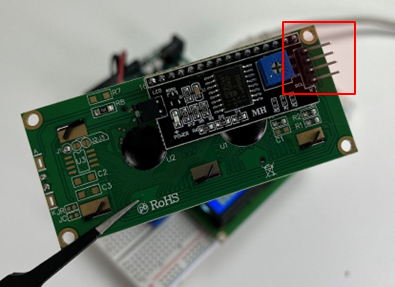 The 4 pins on the LCD module with the I2C