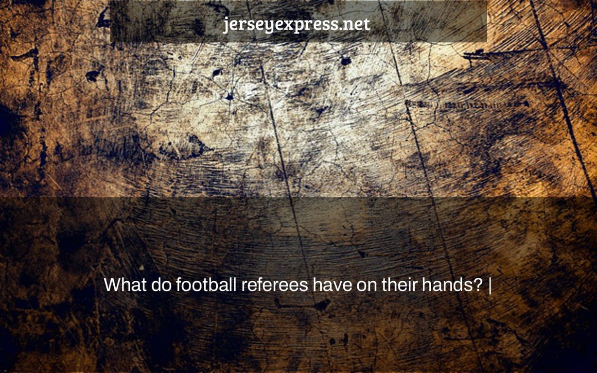 What do football referees have on their hands? |