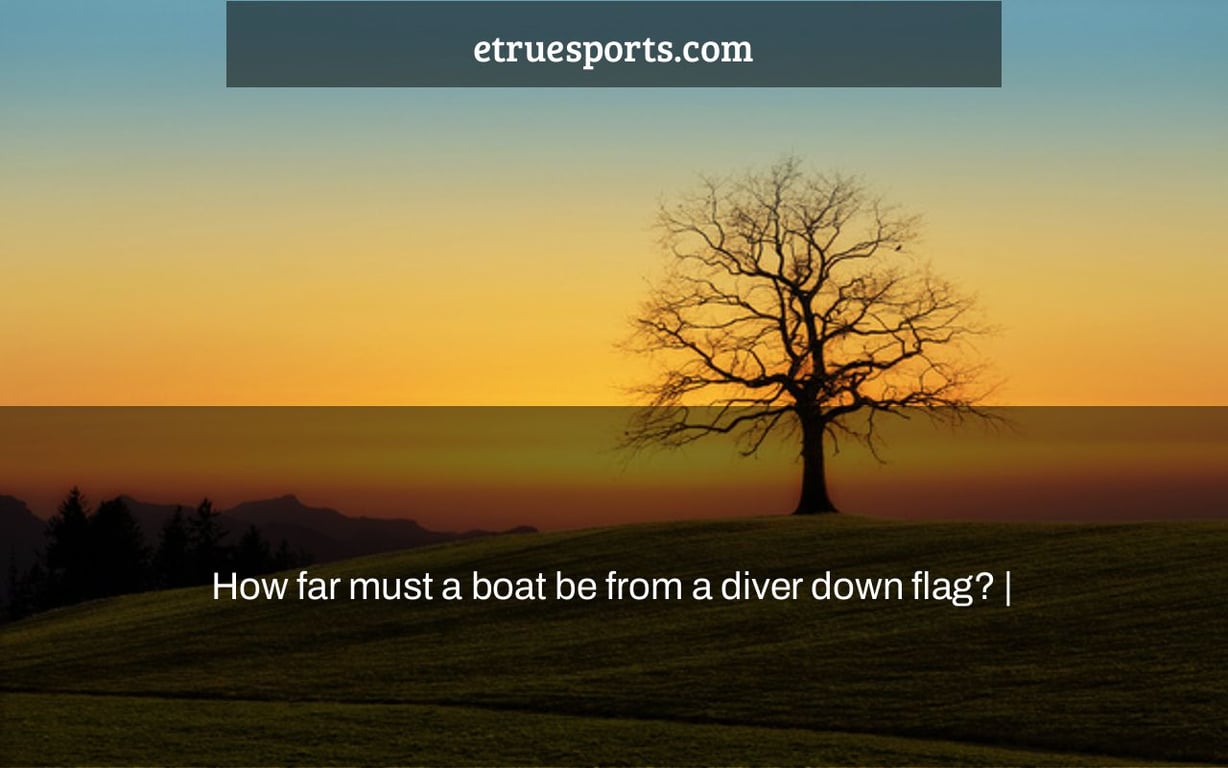 How far must a boat be from a diver down flag? |