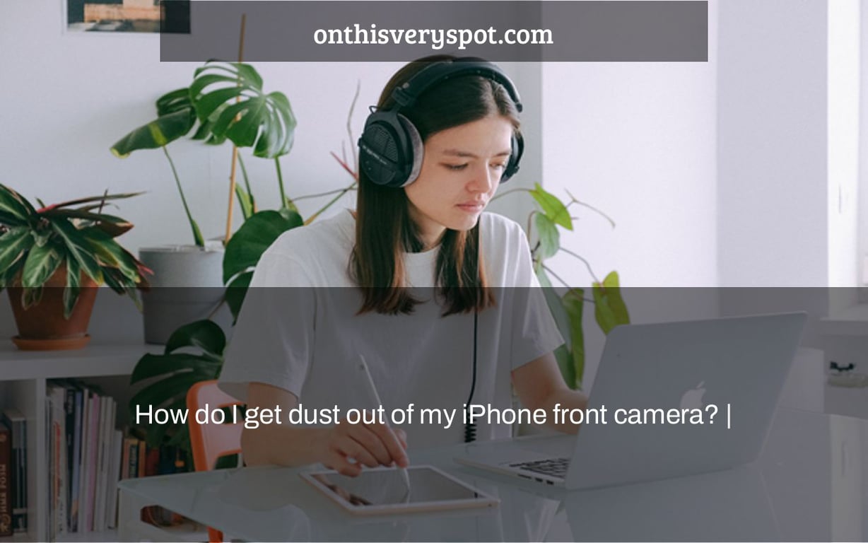 How do I get dust out of my iPhone front camera? |