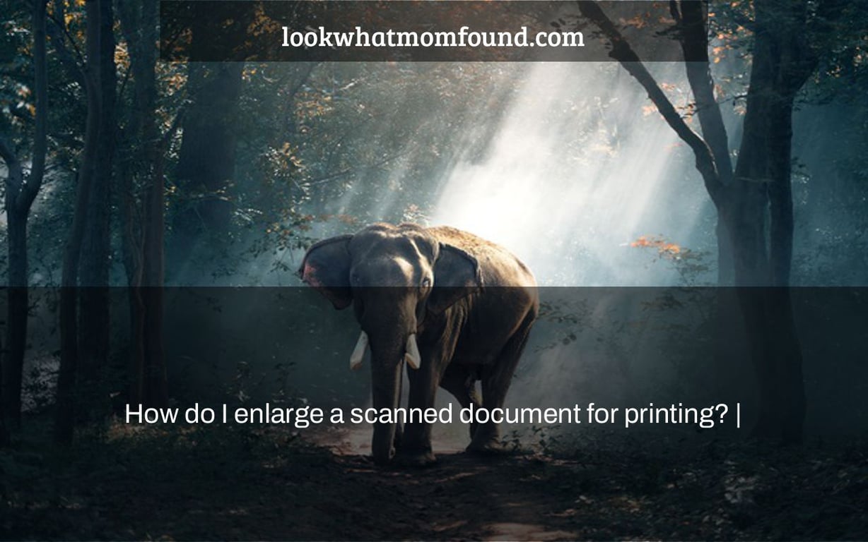 How do I enlarge a scanned document for printing? |