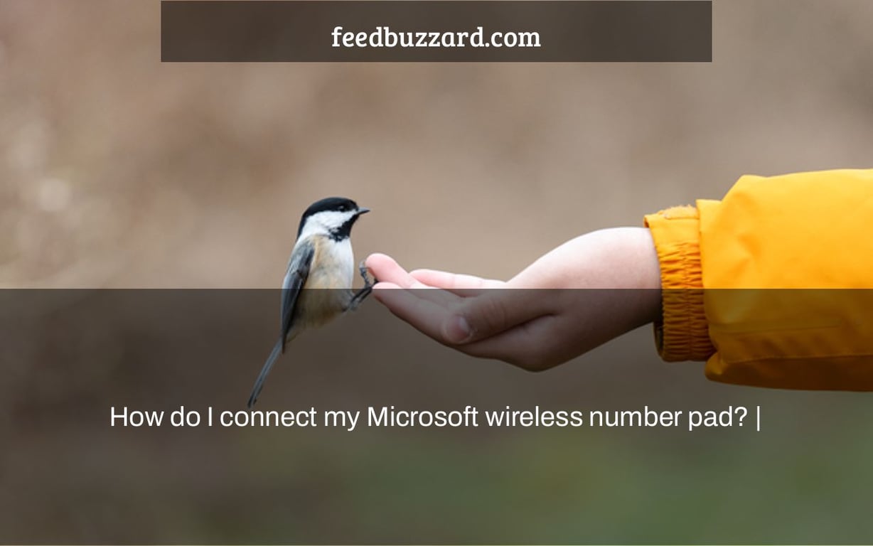 How do I connect my Microsoft wireless number pad? |