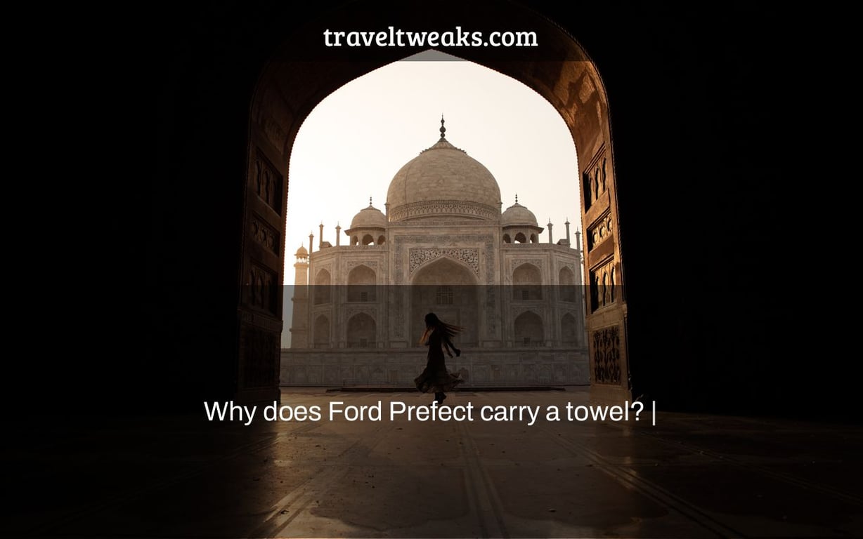 Why does Ford Prefect carry a towel? |