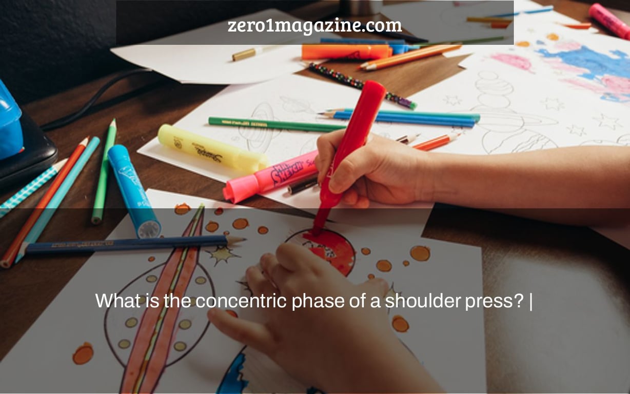 What is the concentric phase of a shoulder press? |