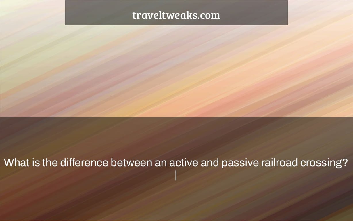 What is the difference between an active and passive railroad crossing? |