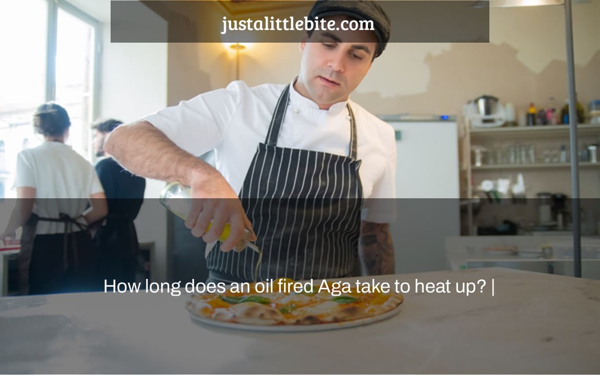 How long does an oil fired Aga take to heat up? |