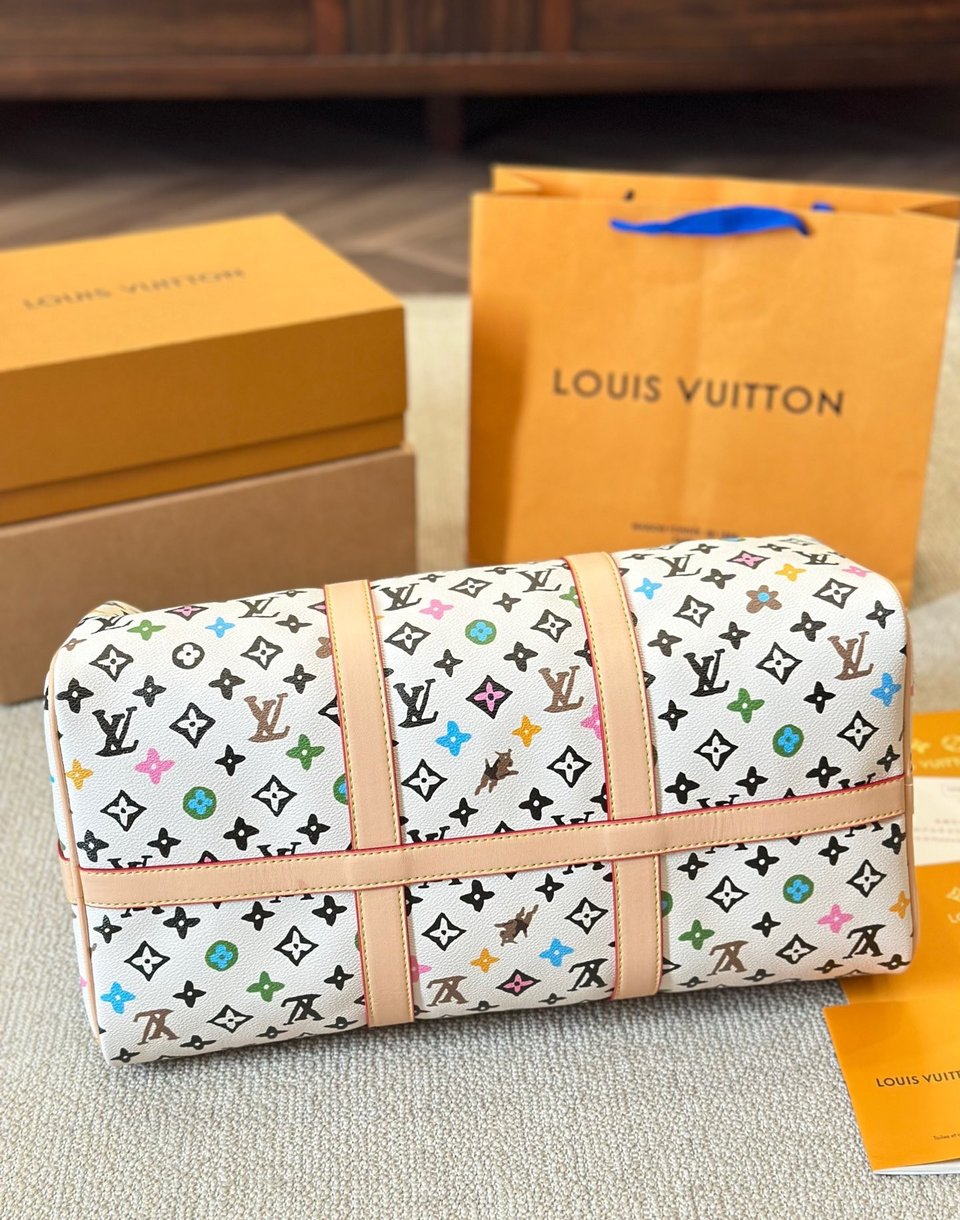 Louis Vuitton Keepall Bandouli Re Vanilla 40Cm M25233 view 4