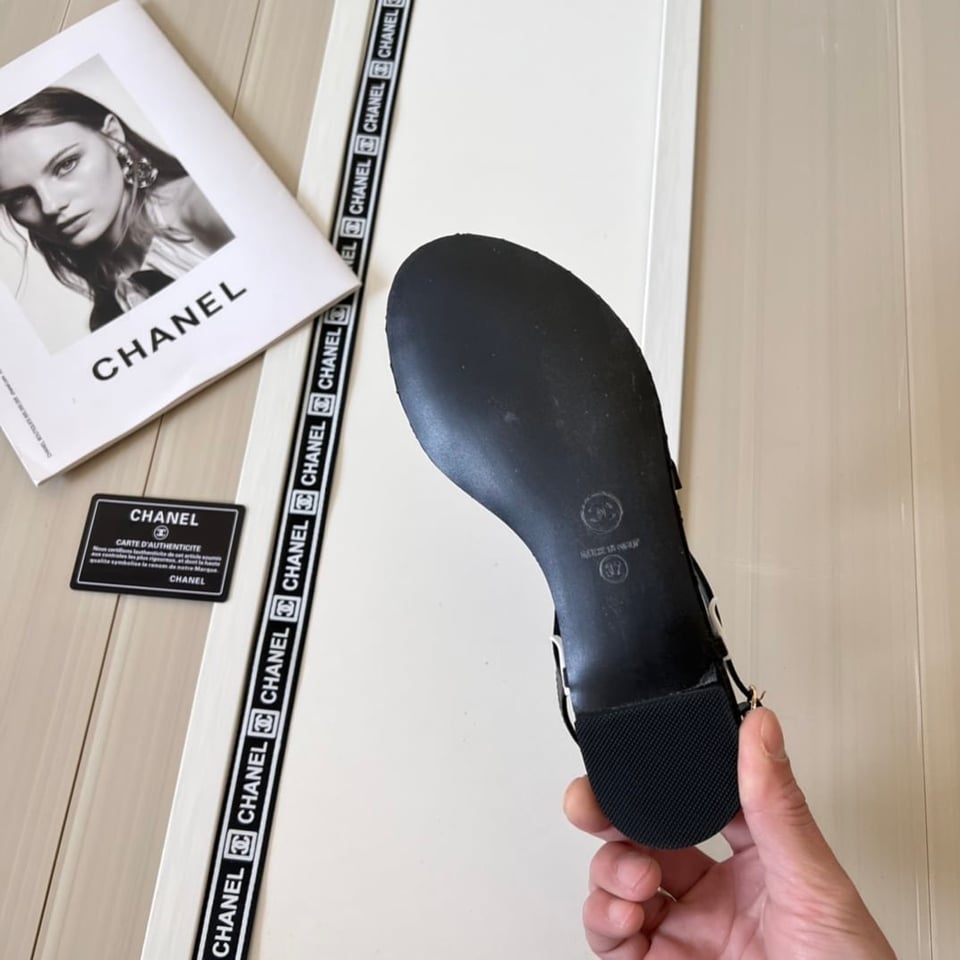 Chanel Black Quilted Leather With White Camellia Cc Logo Sandals G45258 X01000 94305 view 8
