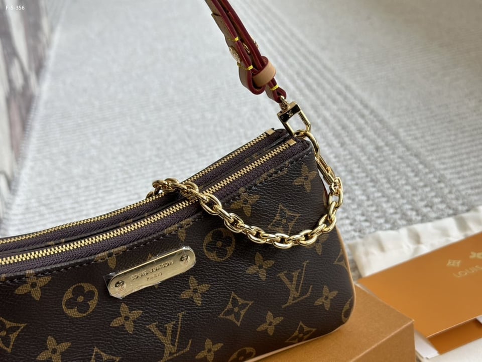 Louis Vuitton Liv Pochette Monogram Coated Canvas 20Cm M83008 view 7