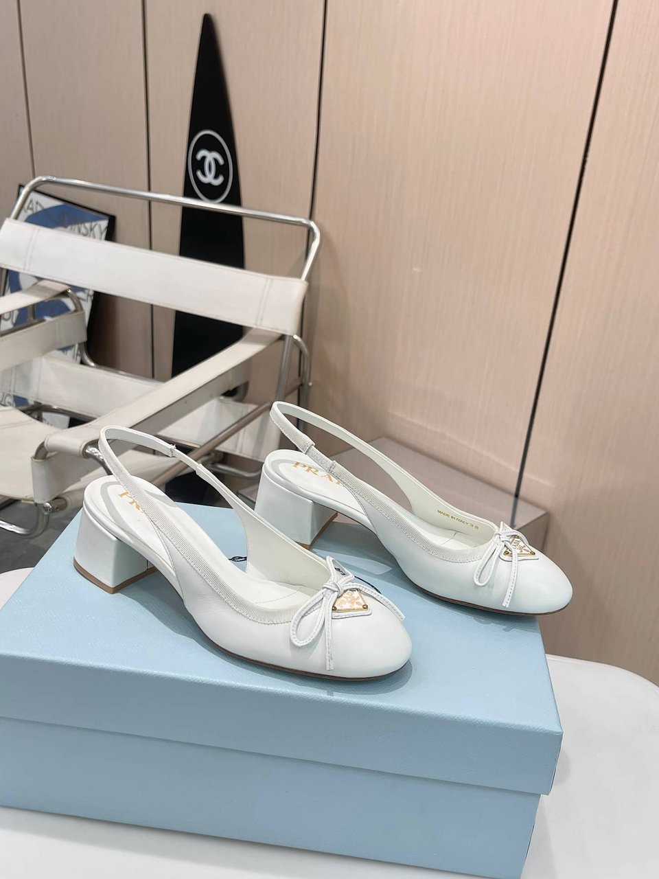 Prada Triangle Logo Bow Slingback Pump In White view 3