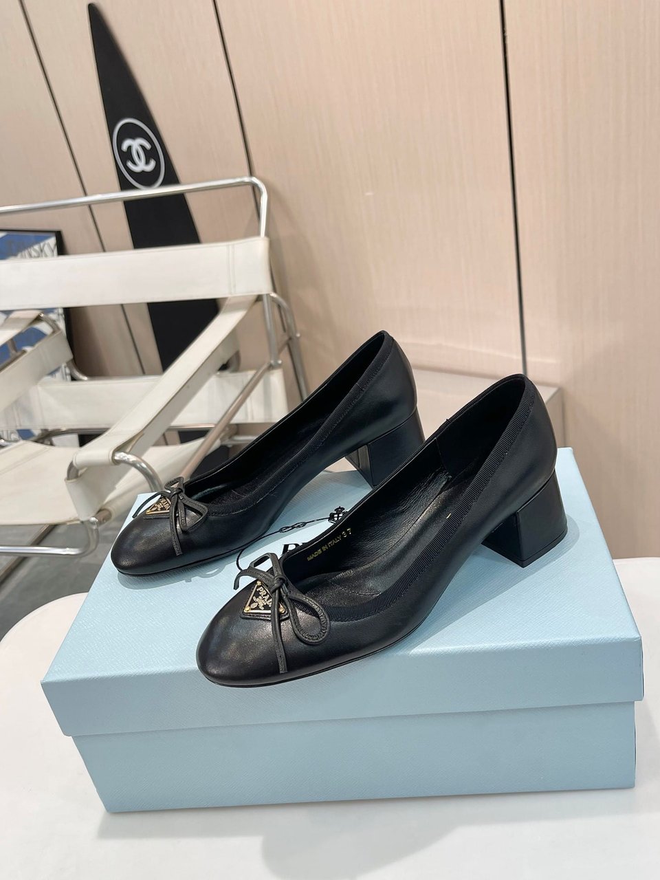 Prada Triangle Logo Bow Pump In Black view 3