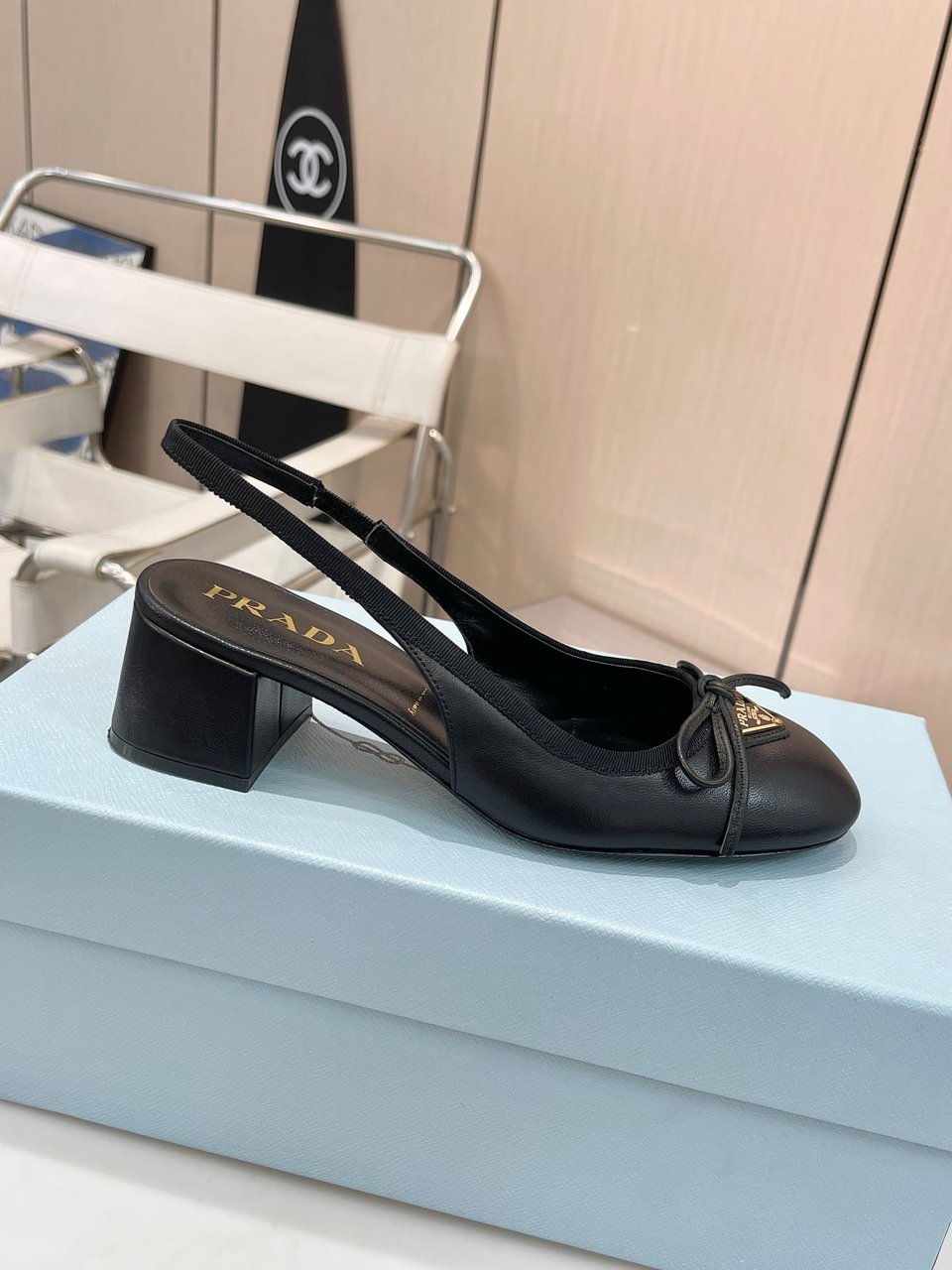 Prada Triangle Logo Bow Slingback Pump In Black view 6