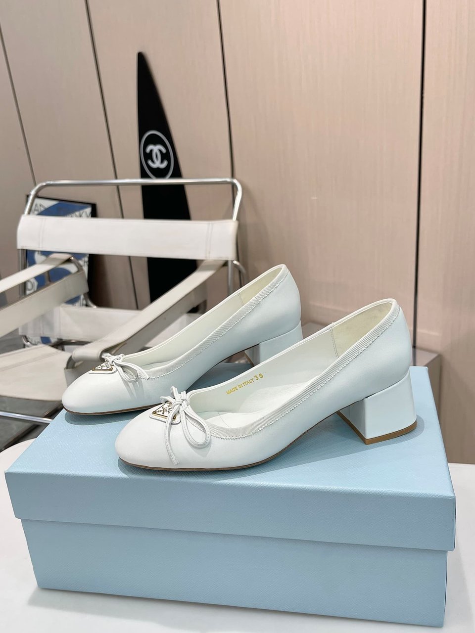 Prada Triangle Logo Bow Pump In White view 3