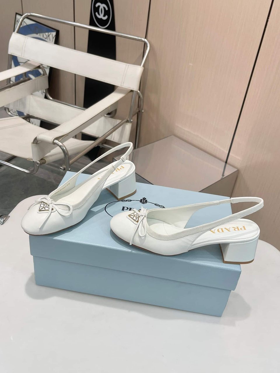 Prada Triangle Logo Bow Slingback Pump In White view 7