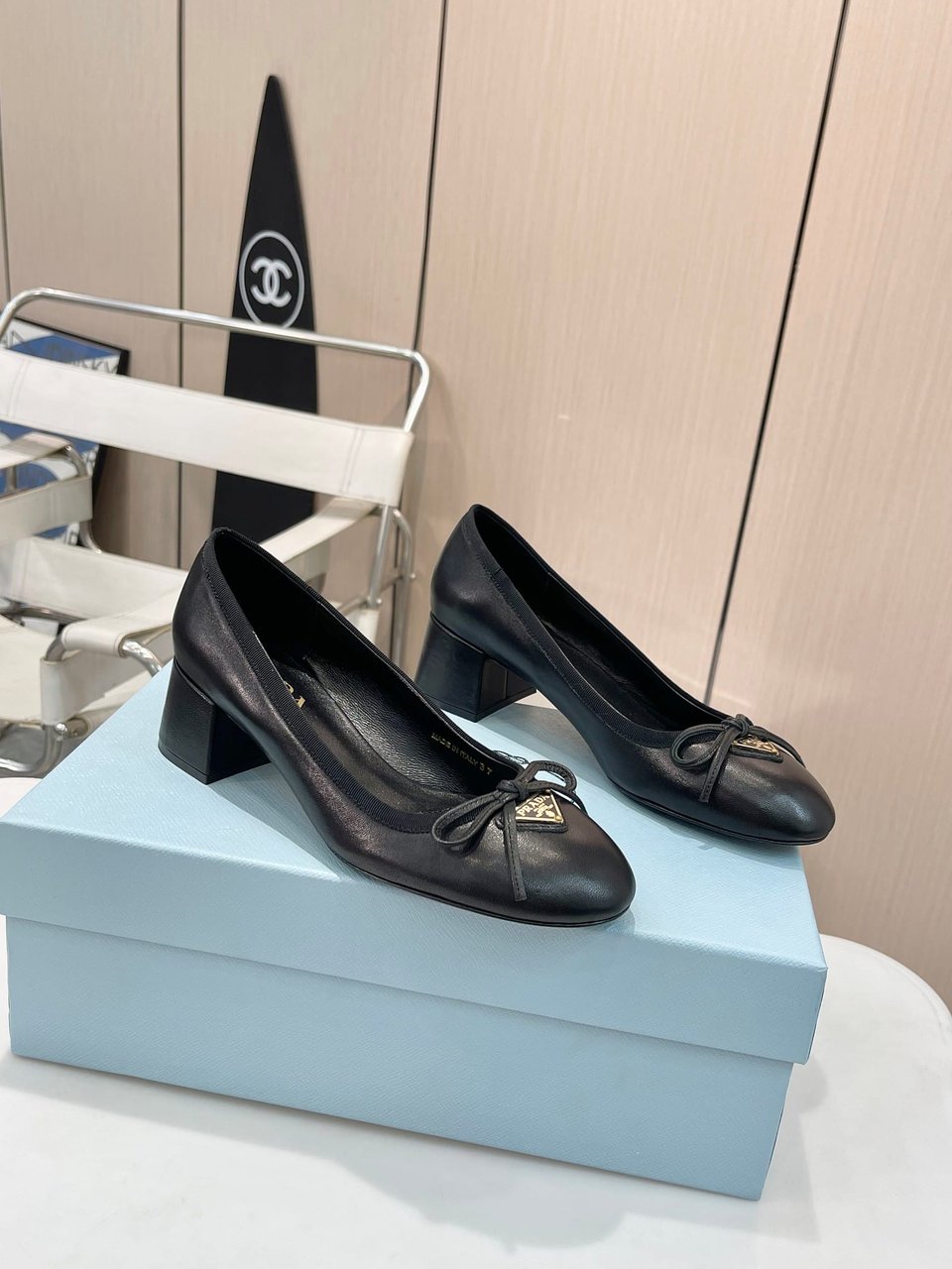 Prada Triangle Logo Bow Pump In Black view 8