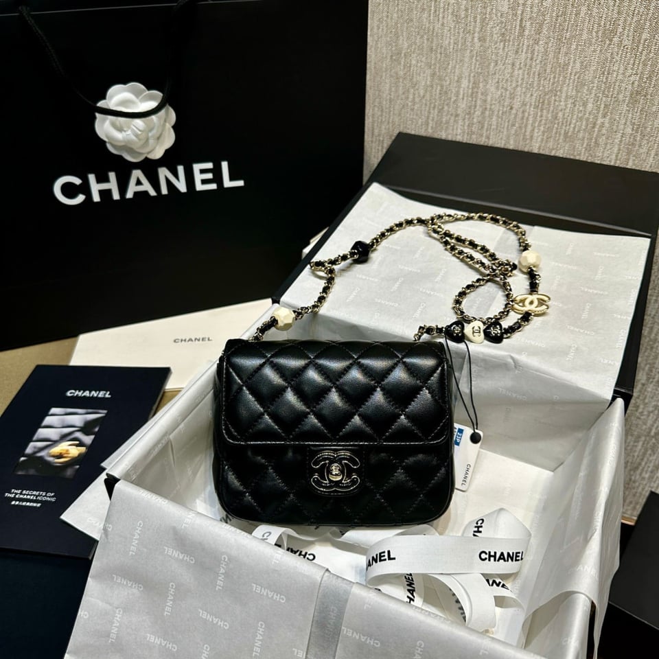 Chanel Mini Flap Bag in Black Lambskin view 7