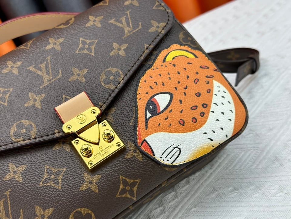 Louis Vuitton Pochette M Tis Monogram Coated Canvas 25Cm M47203 view 8