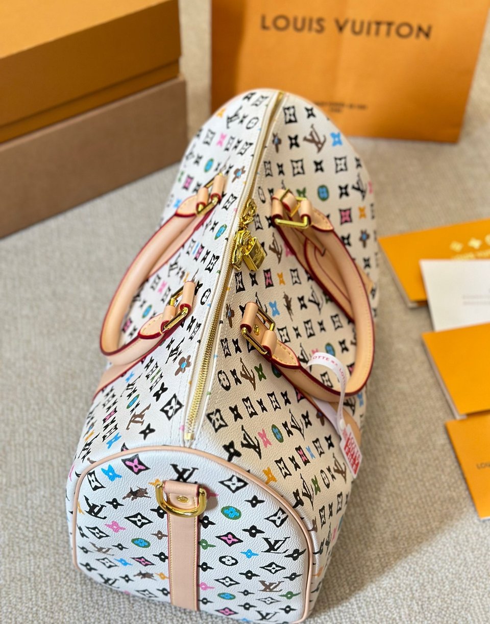 Louis Vuitton Keepall Bandouli Re Vanilla 40Cm M25233 view 5