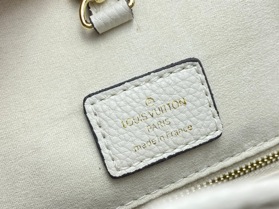 Louis Vuitton On The Go Mm Monogram Empreinte Leather White 34Cm M45717 view 5